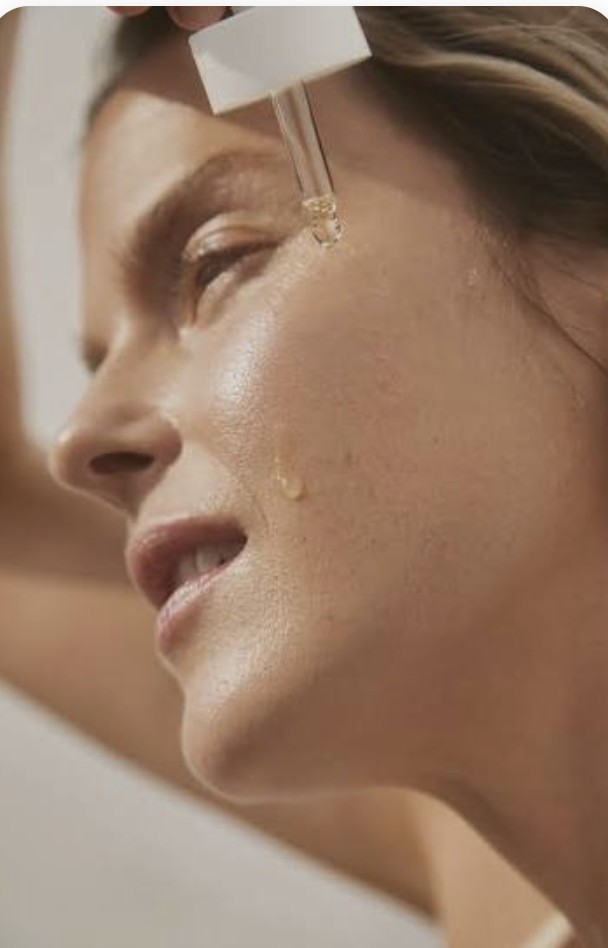 Close-up of a serum drop on skin