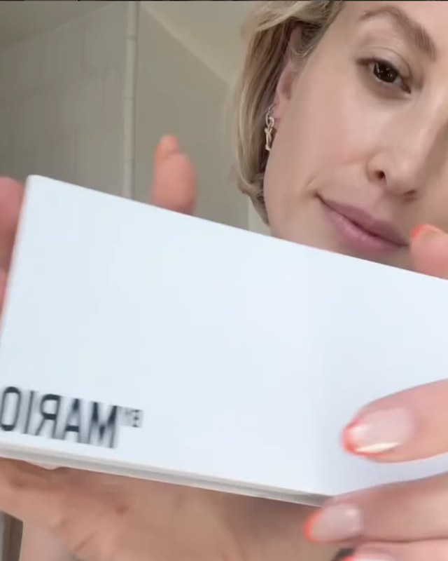 Sarah holding up a new palette box